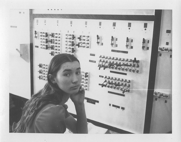 Dawn LeClair, member of the 1975 Wickenburg High School Math Club, sits in front of the paper clip computers' arithmetic unit. (Wickenburg High School)